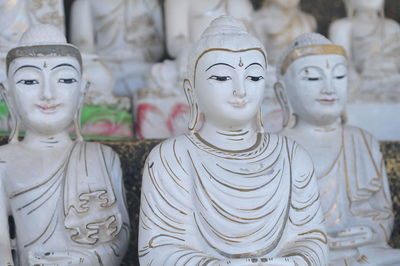 Close-up of buddha statues for sale