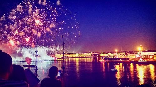 Firework display at night