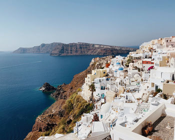 High angle view of town by sea