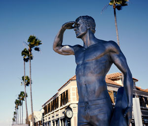 Low angle view of statue in city