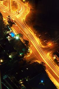 Light trails on city street at night