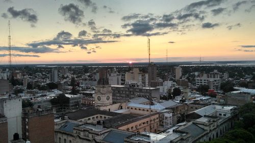 High angle view of cityscape against sky during sunset