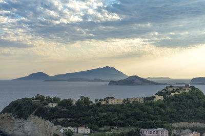 High angle view of buildings and mountains against sky