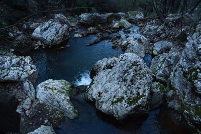 High angle view of river amidst rocks