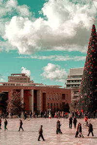 Group of people in city buildings