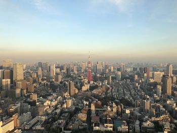 Aerial view of cityscape against sky