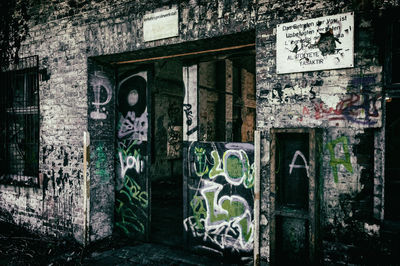 Close-up of graffiti on brick wall