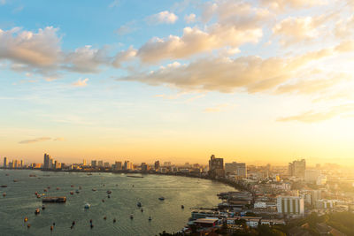 High angle view of city buildings during sunset