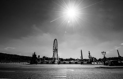Sun shining over river