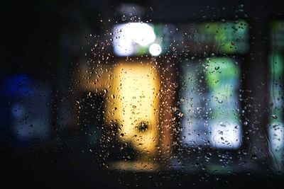 Wet glass window in rainy season