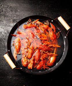 High angle view of seafood in cooking pan