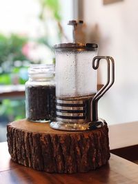 Close-up of coffee set on a wood