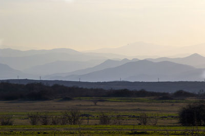 Mountain range landscape during sunset, view of mountain and hill lines, horizon in georgia