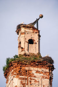 Low angle view of old building against sky