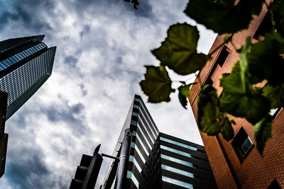 Low angle view of modern buildings against sky