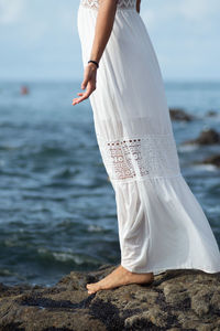Members of candomble are seen on the beach throwing gifts to iemanja on rio vermelho beach