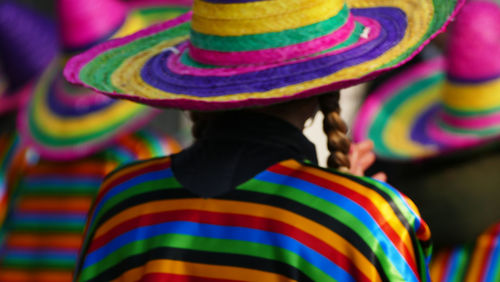 Close-up of multi colored shoes for sale in market