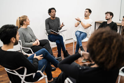 Coworkers discussing in meeting