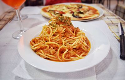 Close-up of noodles served in plate on table