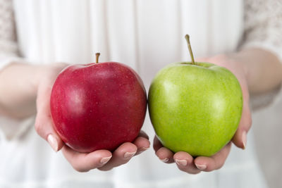 Close-up of hand holding apple