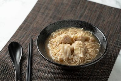 High angle view of noodles in bowl on table