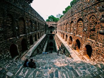 Group of people in old building