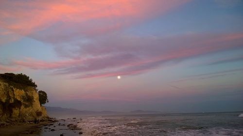 Scenic view of sea against dramatic sky