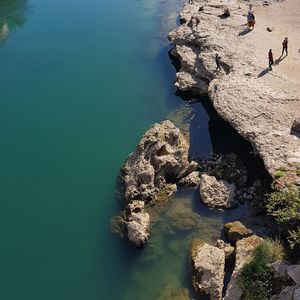 High angle view of rock formation in sea