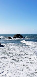 Scenic view of sea against clear sky