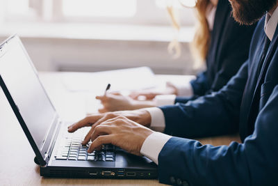 People working on laptop