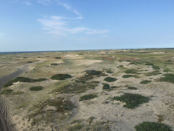 Scenic view of land against sky