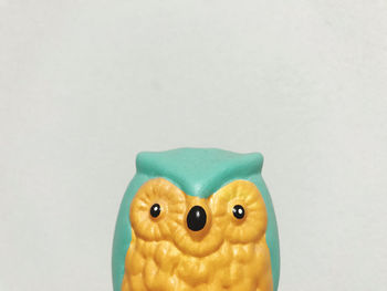 Close-up of stuffed toy against white background