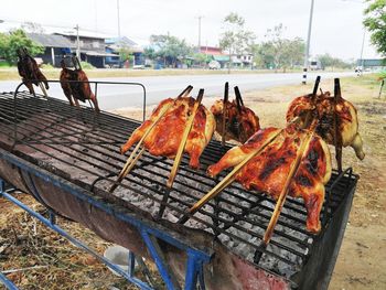 Close-up of fish on barbecue grill