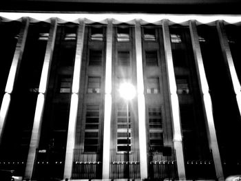 Low angle view of illuminated building at night