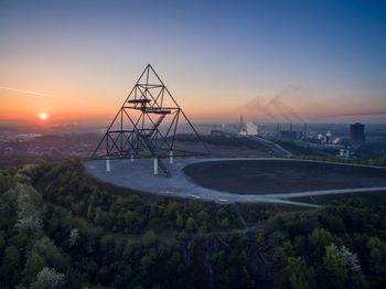 Built structure against sky during sunset