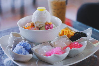 Dessert in bowls on table