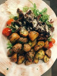 High angle view of vegetables in plate on table