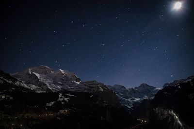 Low angle view of mountain range against sky
