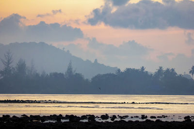 Scenic view of sea against sky during sunset