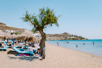 Panoramic view of beach against clear sky