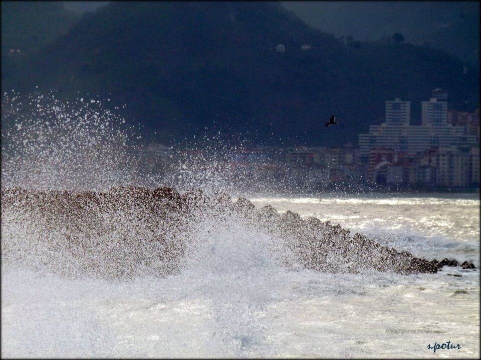 water, sea, wave, surf, motion, splashing, waterfront, beach, nature, shore, auto post production filter, building exterior, built structure, horizon over water, architecture, power in nature, outdoors, beauty in nature, scenics, transfer print