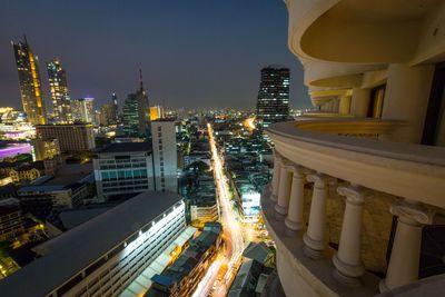 Illuminated buildings in city at night