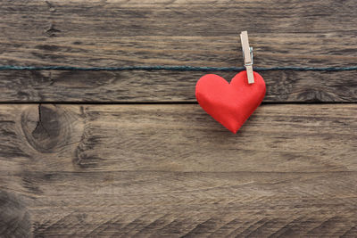 Directly above shot of heart shape on wooden table