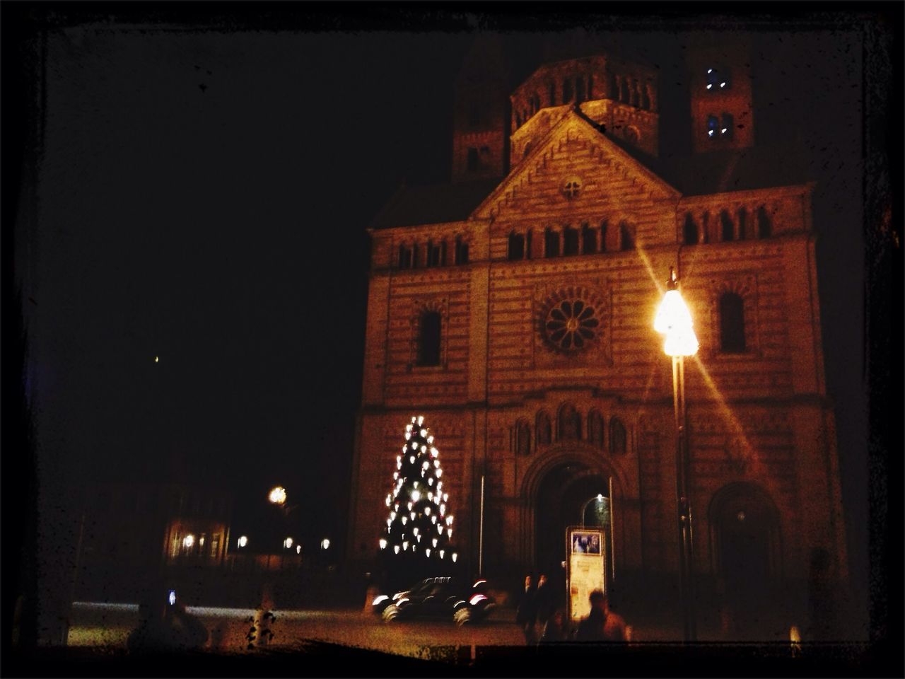 illuminated, night, built structure, building exterior, architecture, place of worship, religion, spirituality, lighting equipment, church, dark, glowing, sky, outdoors, light - natural phenomenon, clear sky, house, no people, street light