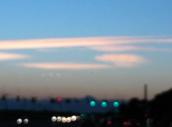 High angle view of silhouette landscape against sky