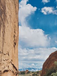 Low angle view of rock formation against sky