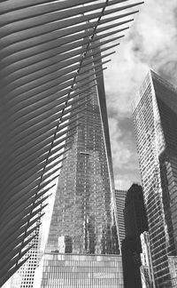 Low angle view of skyscrapers against sky