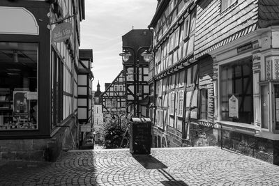 Street amidst buildings against sky