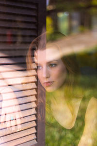 Portrait of young woman looking away