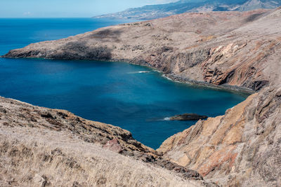 High angle view of bay against clear sky